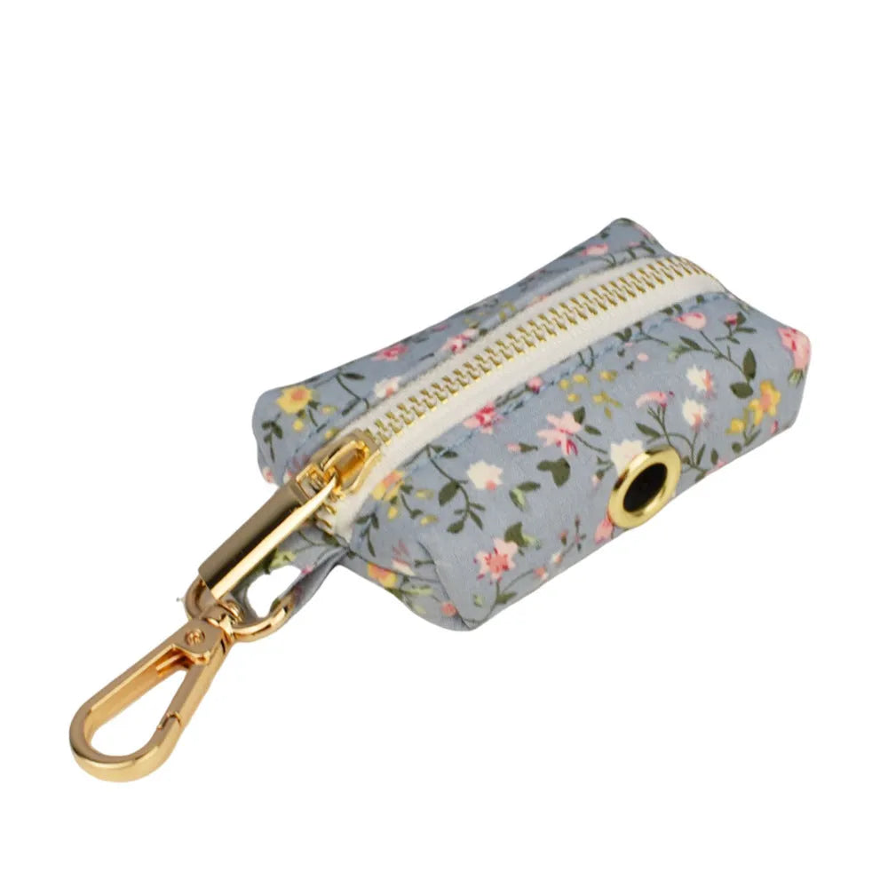 Floral pattern dog collar set with leash, vest, bow tie, and poop bag accessories in multiple sizes