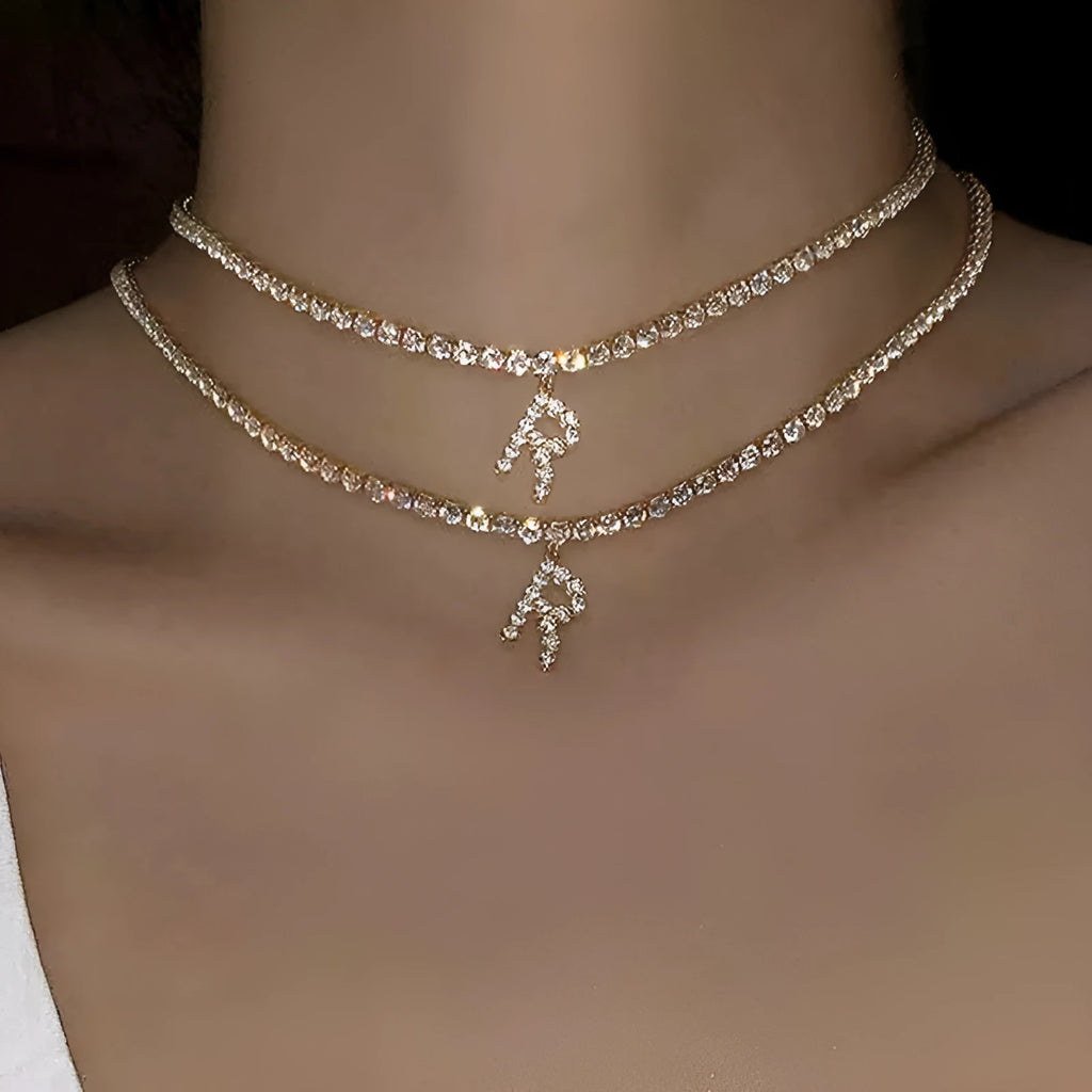 Personalised diamond letter necklace with rhinestone pendant on claw chain in gold finish