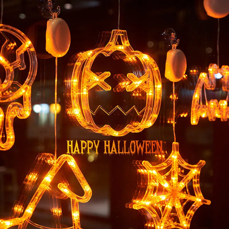 Set of seven Halloween LED hanging lights with spider, pumpkin, and ghost designs for window decoration