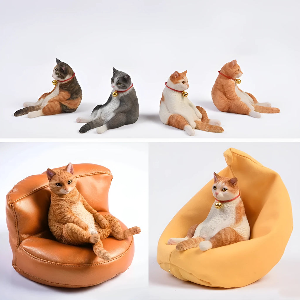 Sleeping cat figurine on miniature sofa car dashboard ornament