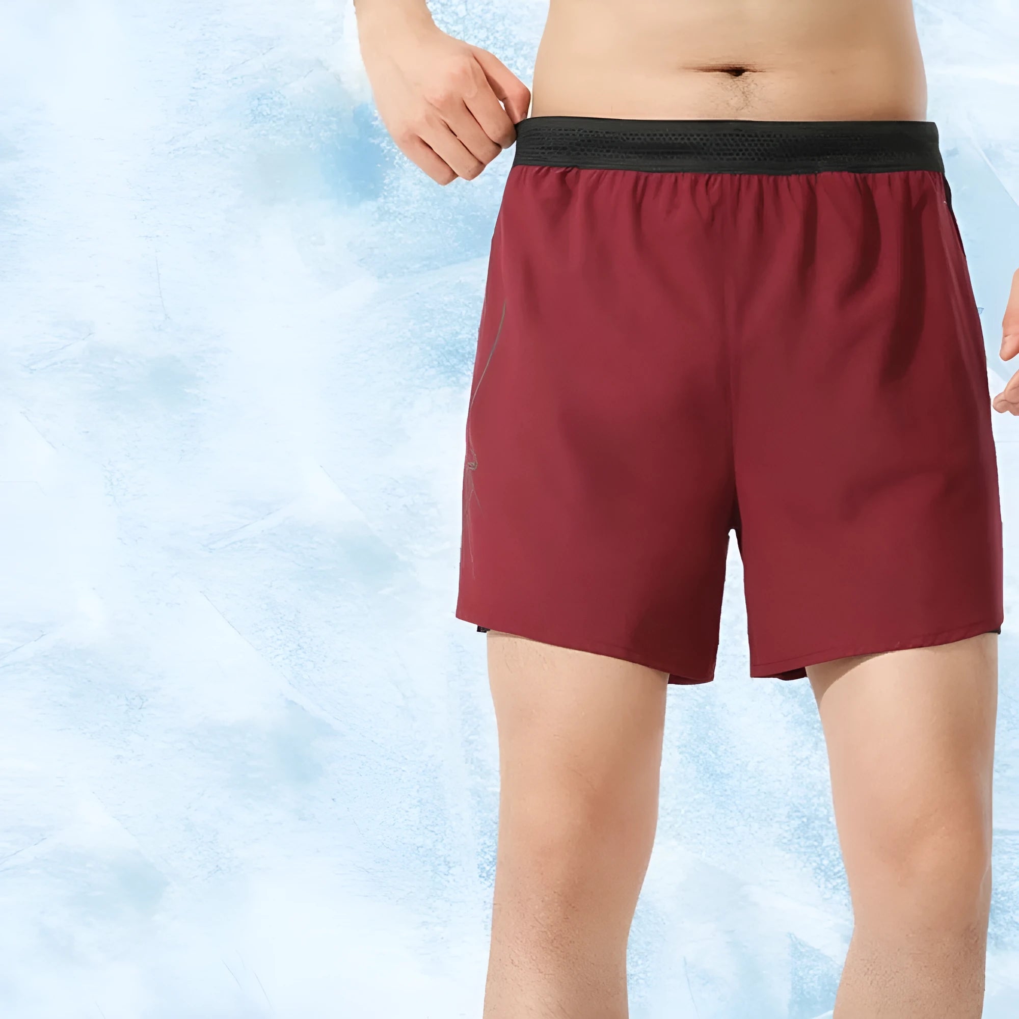 Men's solid colour polyester basketball shorts with a low-waist design on a neutral background.