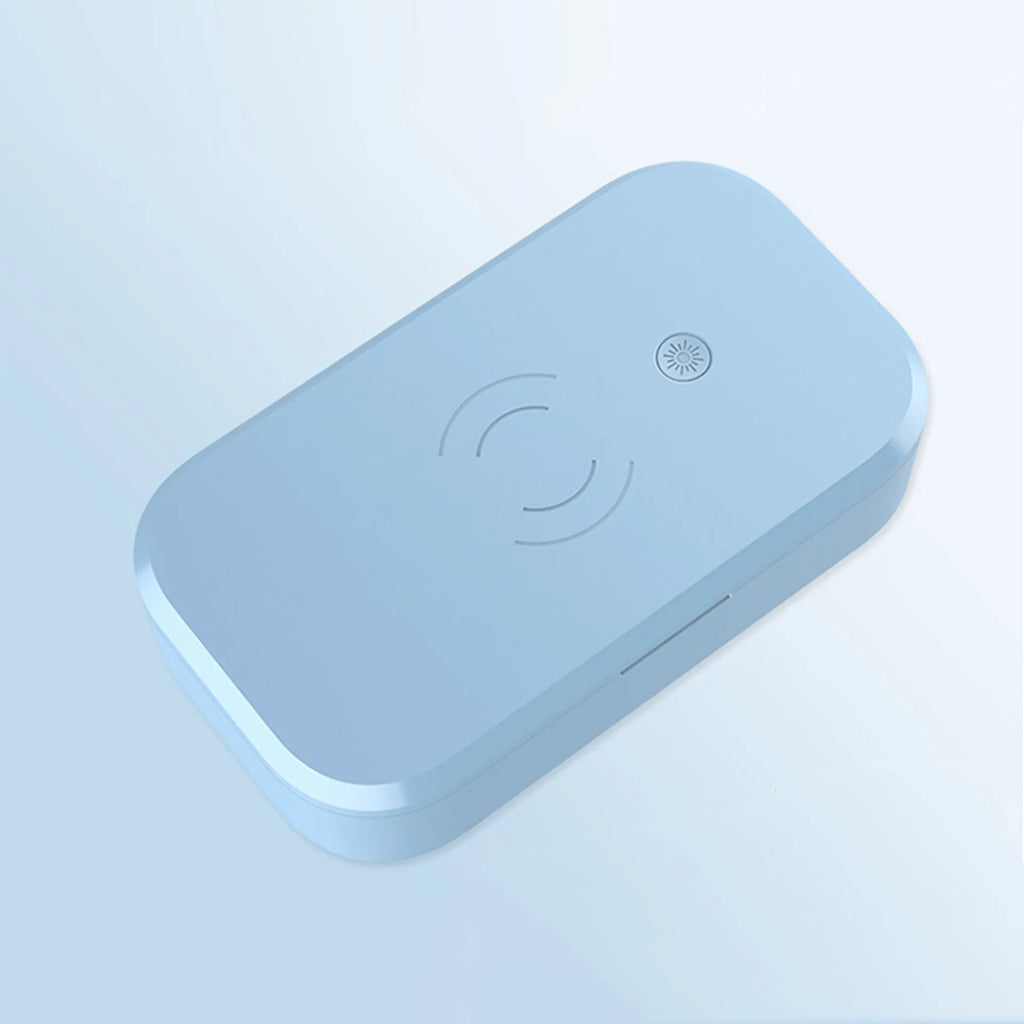 A white multifunctional UV disinfection box with wireless charging for mobile phones and nail art tools.