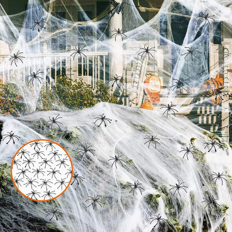 White cotton spider web Halloween decorations with spiders on dark background