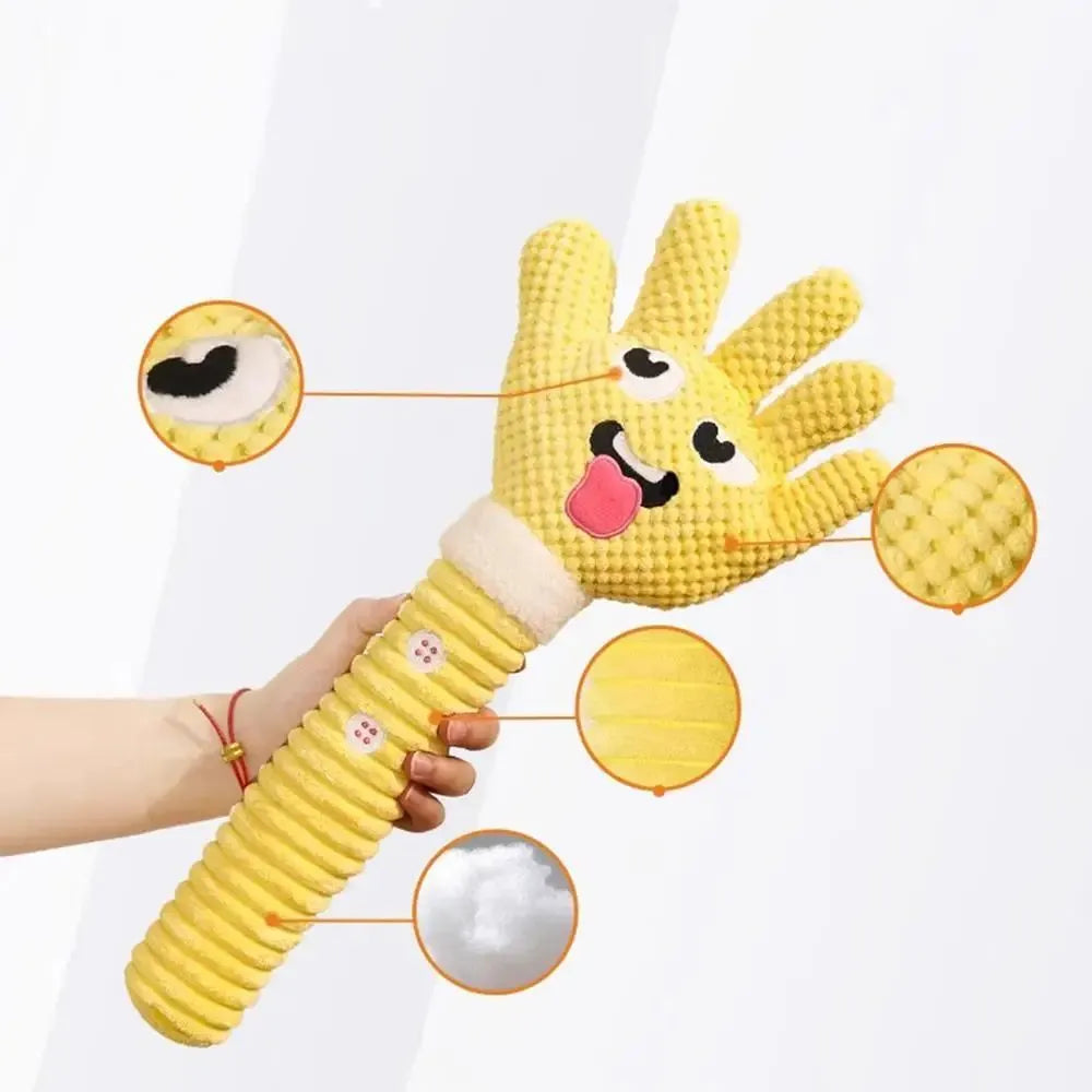 Yellow palm-shaped plush dog teething toy with squeaker for puppies