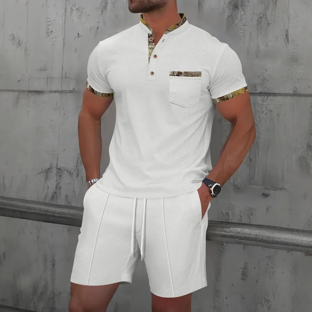 Men's grey sport suit with short sleeve polo collar top and matching shorts on mannequin