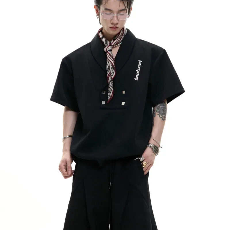 Men's dark grey V-neck cotton sports suit with padded shoulder jacket and matching shorts.