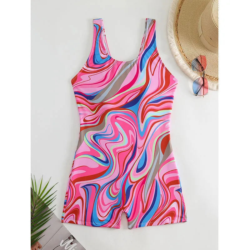 Women's printed one-piece swimsuit with a backless design and high waist.