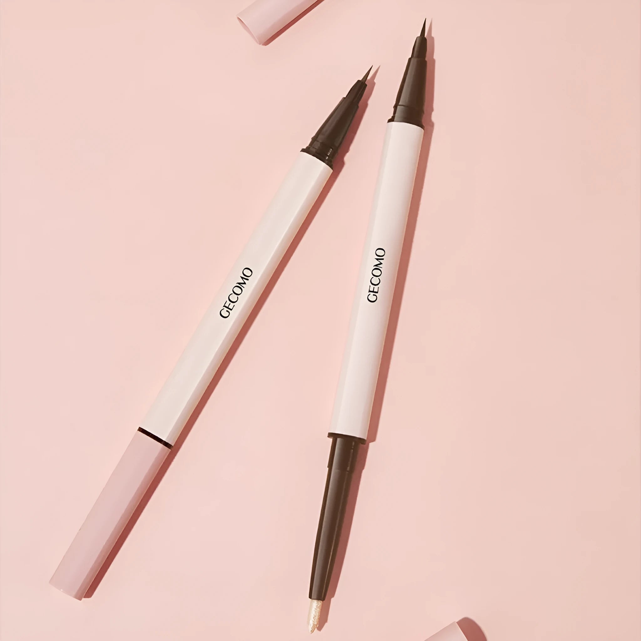Dual-tip liquid eyeliner with star brush and silkworm pen in pearlescent colours