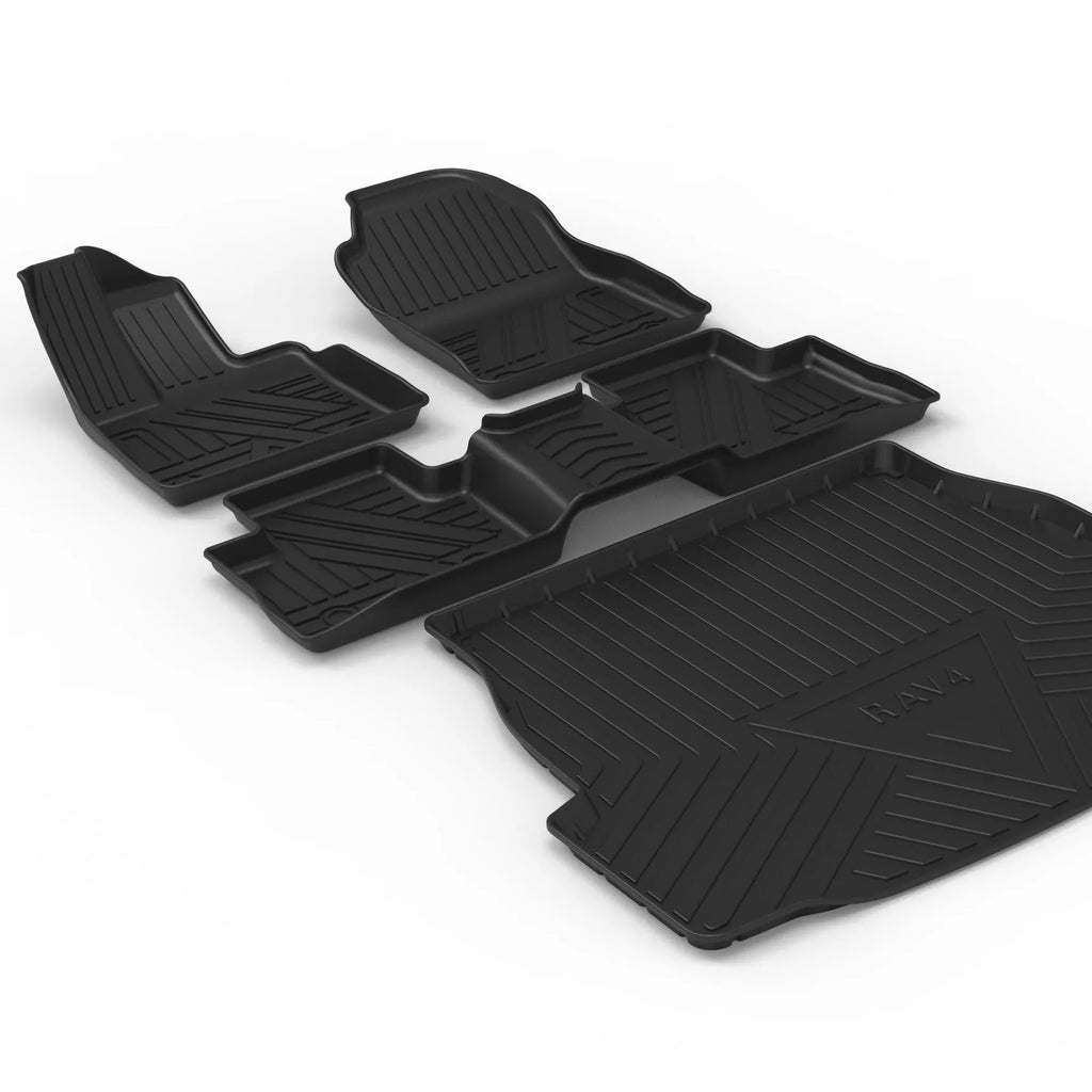 Black carbon fibre pattern TPE car boot liner mat fitted in a hatchback trunk.
