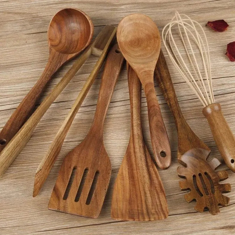 Seven-piece wooden cooking utensil set including spoon and slotted spoon for non-stick pans.