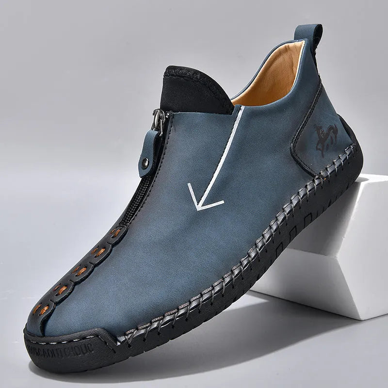 Men's black casual zip-up Martin boots with round toe and low heel on a white background.