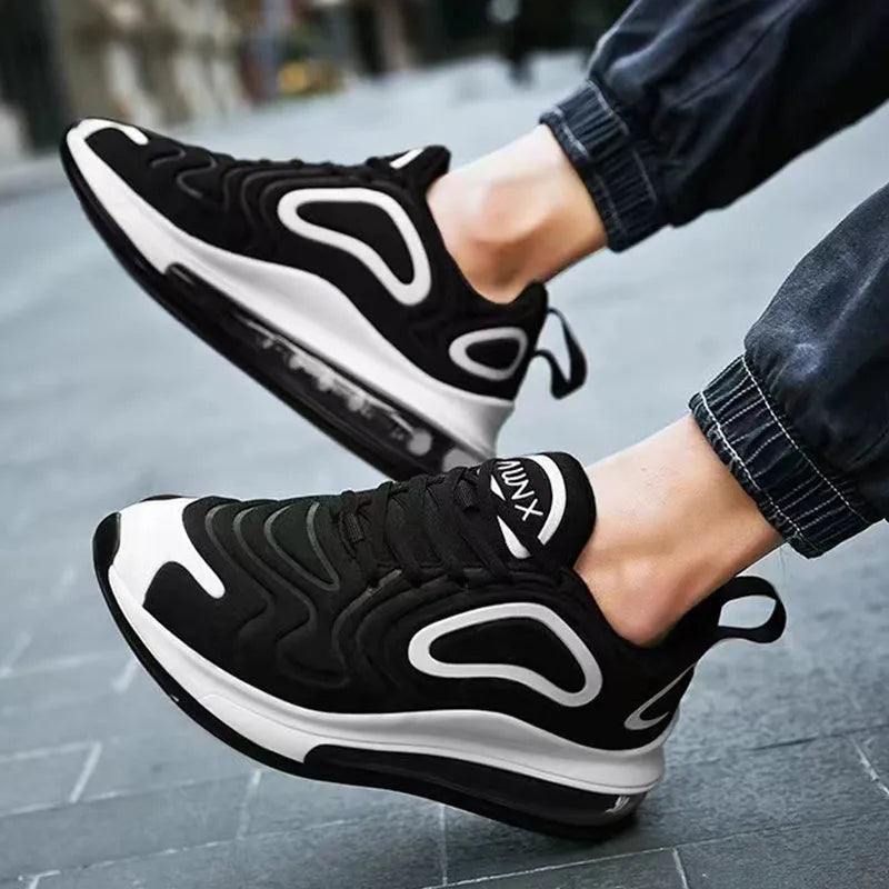 Men's black casual air cushion sneakers with thick sole and lace-up front.
