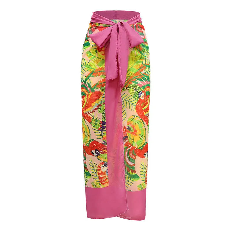 Retro pink floral print women's one-piece swimsuit with V-neck and attached thin skirt.