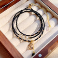 Blue and gold three-ring women's bracelet with sand stone cut beads showing manual processing texture details