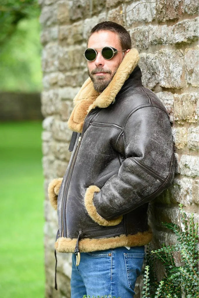 Brown retro synthetic leather fur coat for men, medium length with straight hem and side pockets.