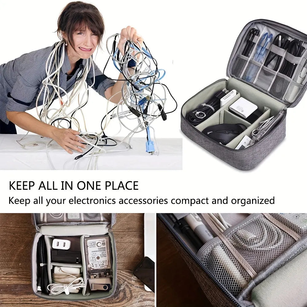 Black electronics organiser case open showing mesh pockets, elastic loops, and removable padded dividers for cable organisation