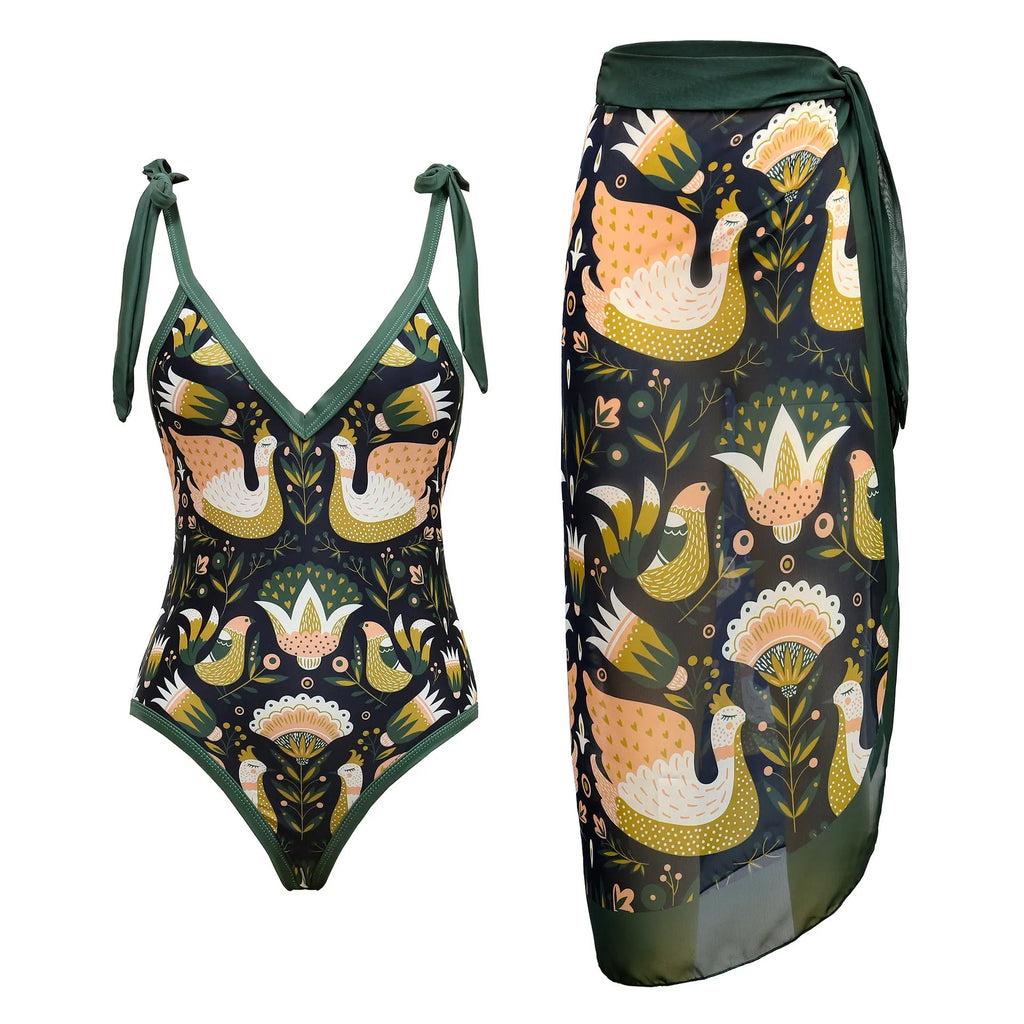 Women's solid colour one-piece swimsuit with spaghetti straps and a detachable skirt.