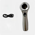 Handheld appraisal magnifying glass with optical glass lens in black and silver on white background