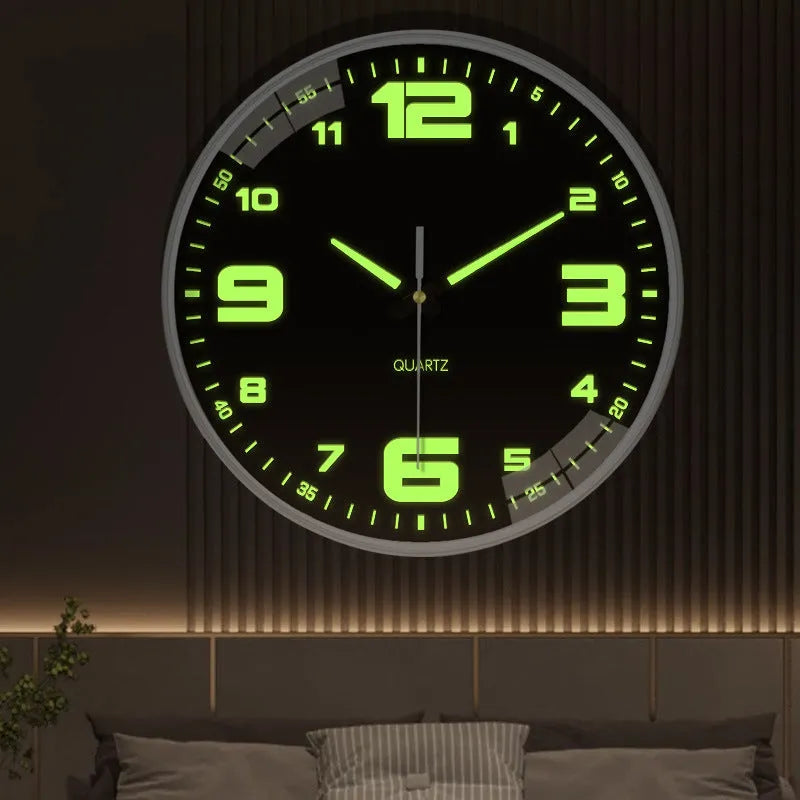 Modern 8 inch diameter luminous wall clock with plastic shell on a wall.