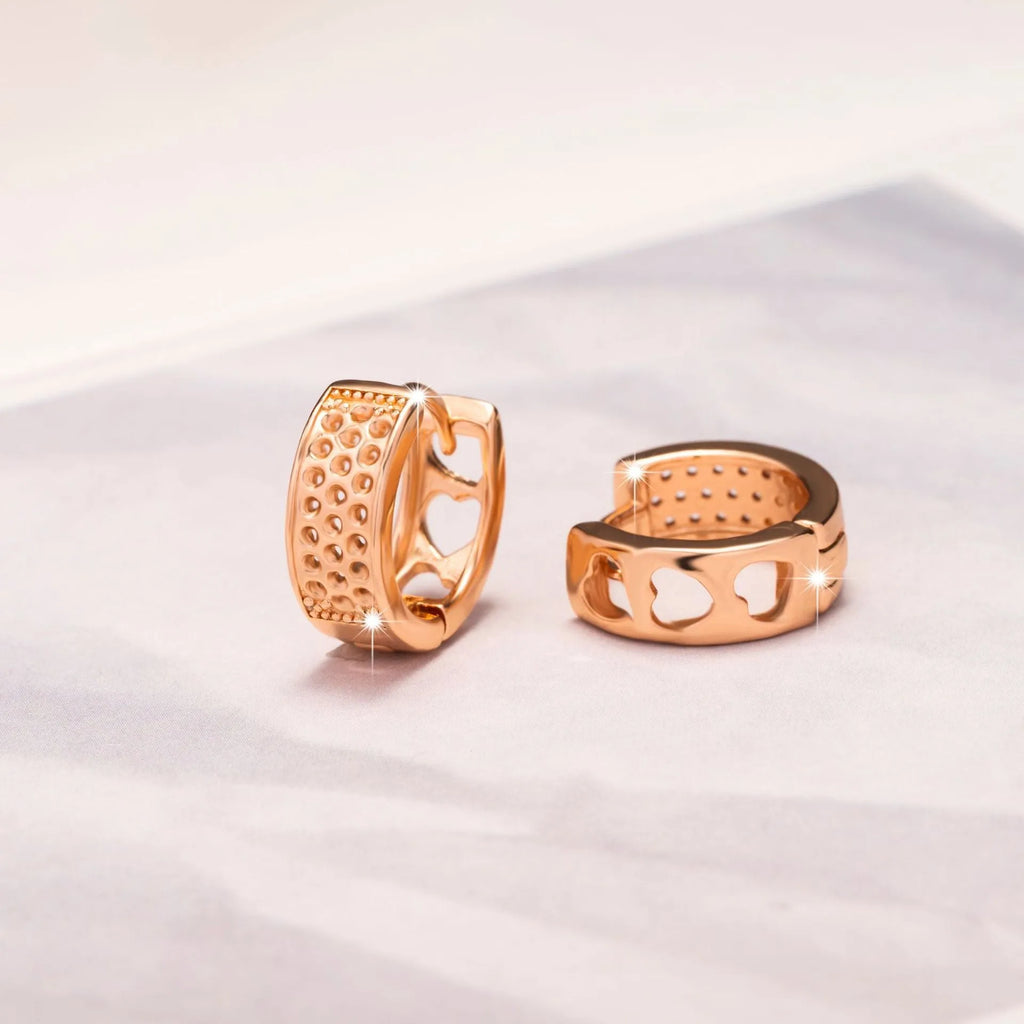 Rose gold hollowed-out heart-shaped women's earrings with circular silhouette