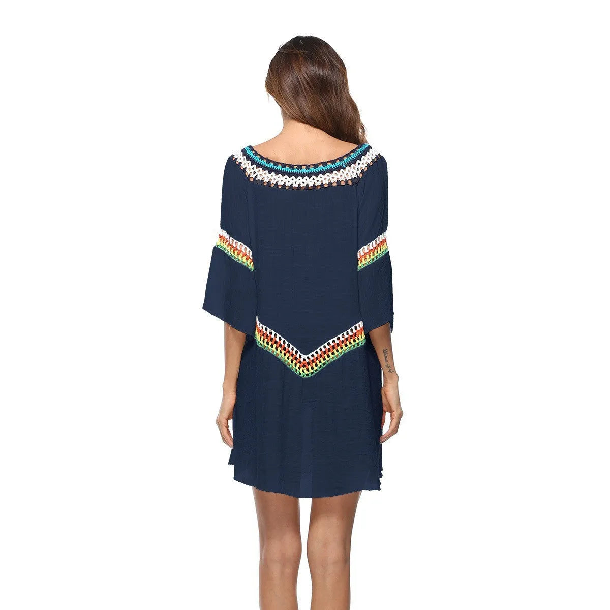 Crocheted ethnic style sun protection beach clothing for women in white, black, sapphire blue, or apricot.
