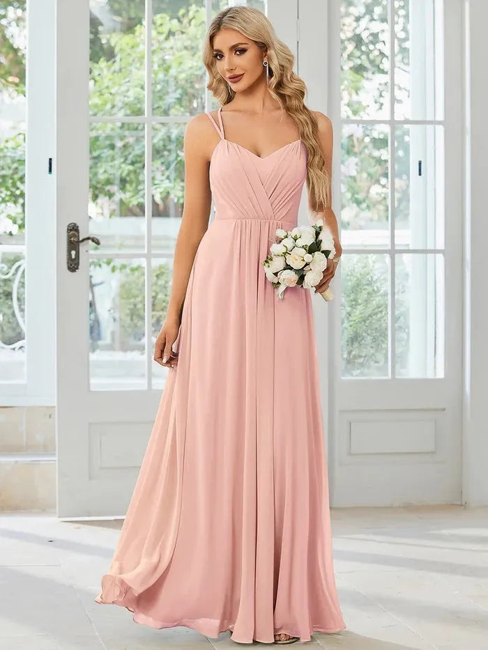Women's sleeveless long banquet dress with pleated A-line skirt in light green, wine red, navy blue, or purple.