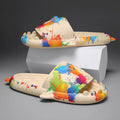 Cute shark graphic EVA open-toe home slippers for adults on a white background.