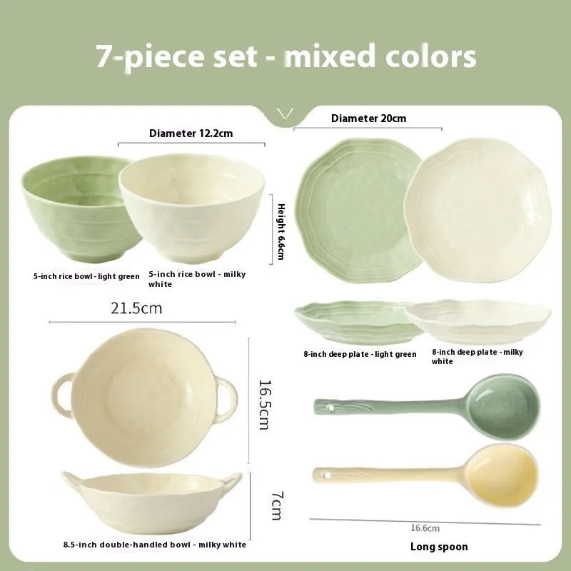 Seven-piece solid colour ceramic tableware set in a gift box, showing minimalist Japanese style plates and bowls.