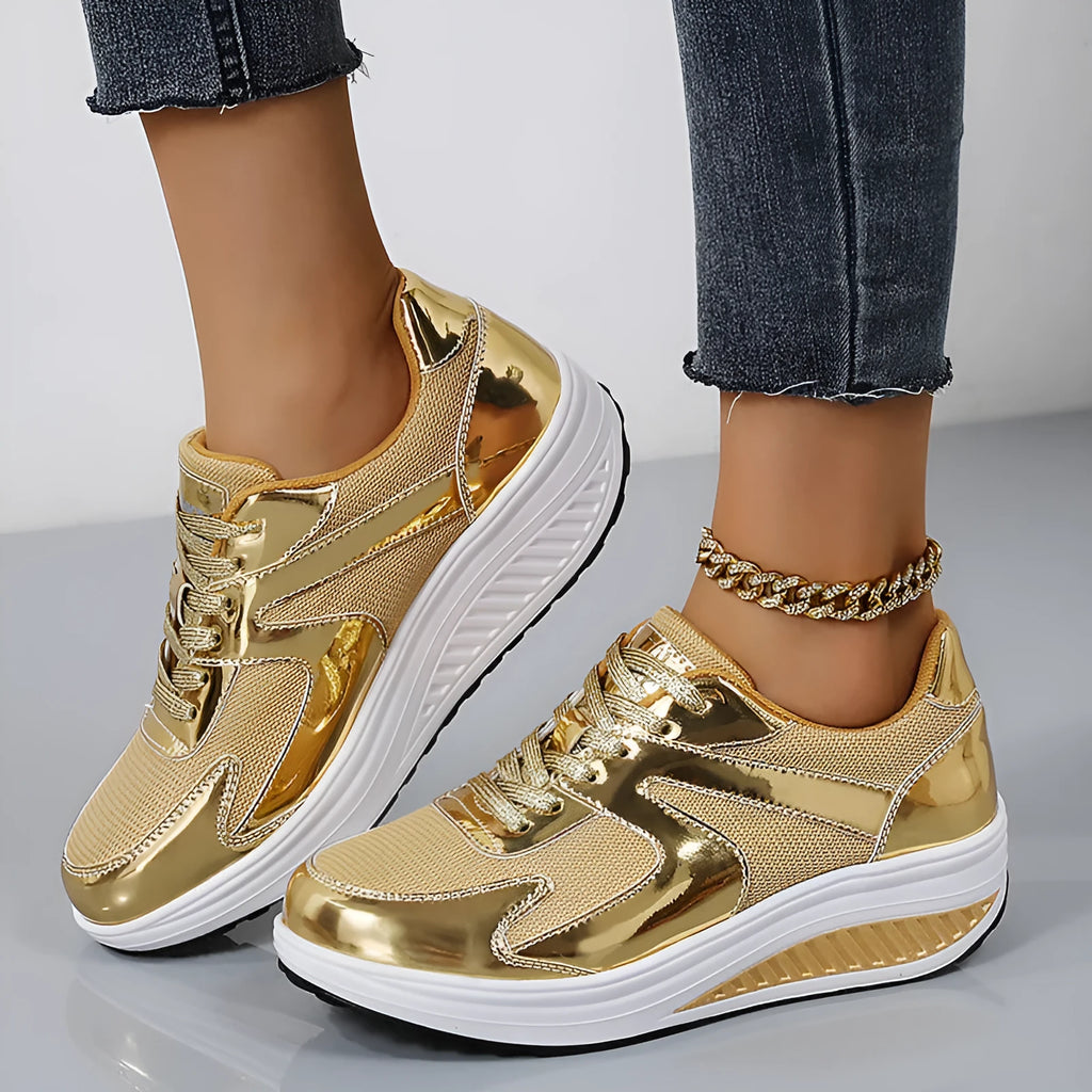 Women's gold thick bottom mesh elevator cross strap shoes with round toe and waterproof platform on light background