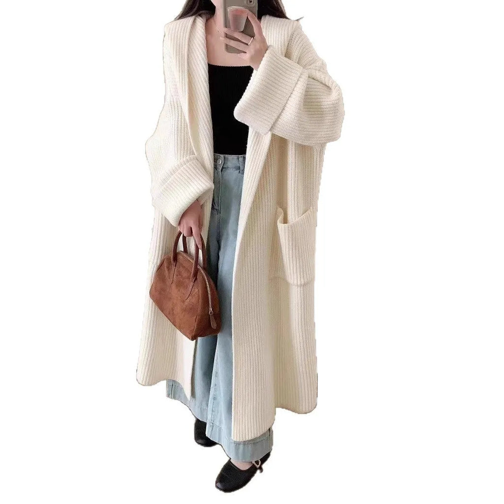 Loose hooded acrylic cardigan coat with extended length and raglan sleeves