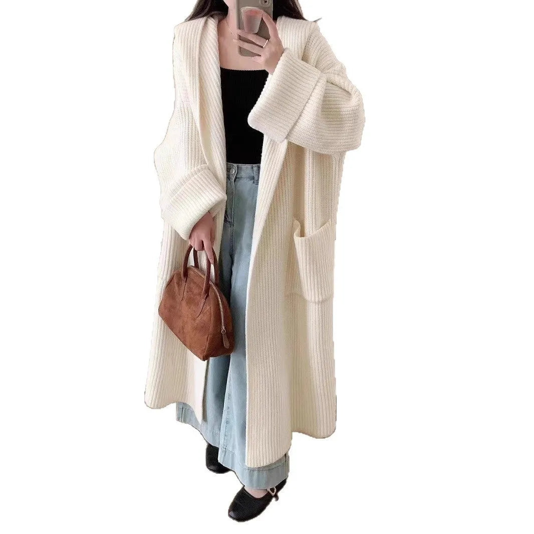 Loose hooded acrylic cardigan coat with extended length and raglan sleeves
