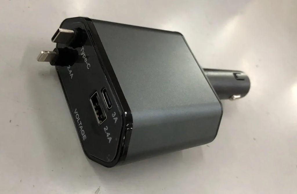 Car charger with retractable cable plugged into vehicle cigarette lighter socket