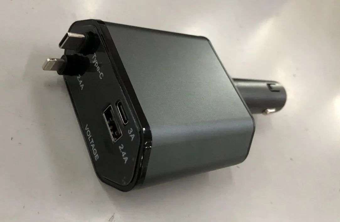 Car charger with retractable cable plugged into vehicle cigarette lighter socket