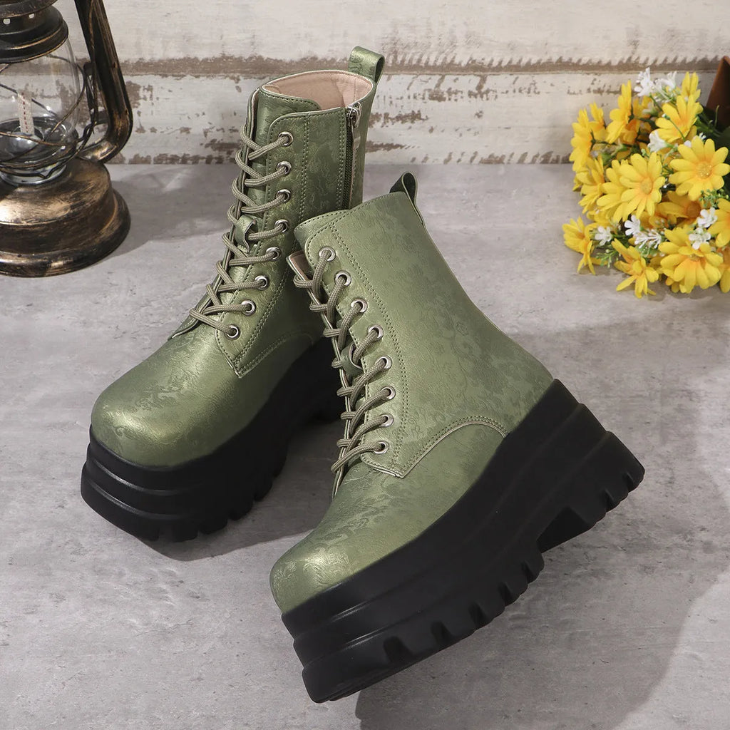 Women's black platform boots with chunky heel and side zipper closure