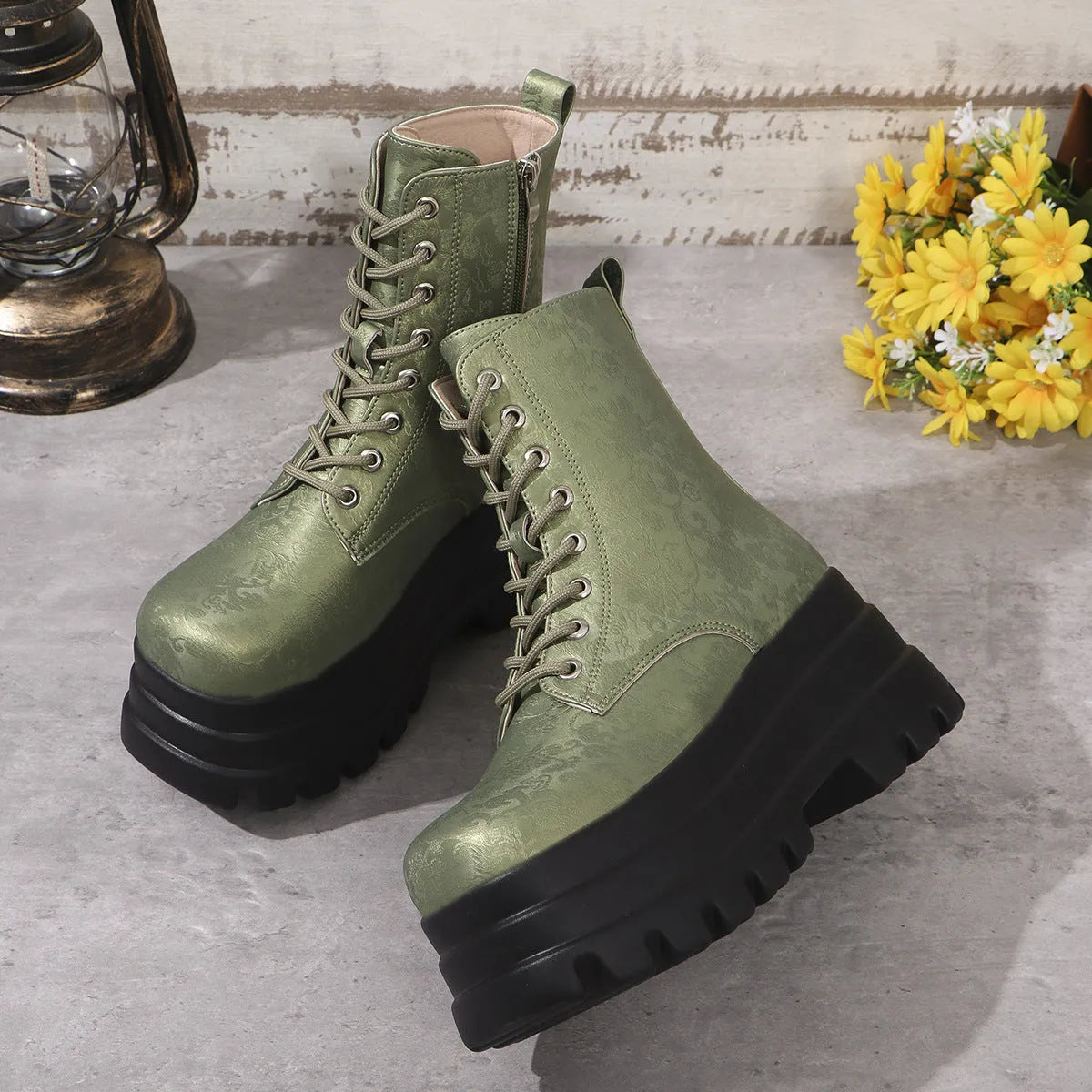 Women's black platform boots with chunky heel and side zipper closure