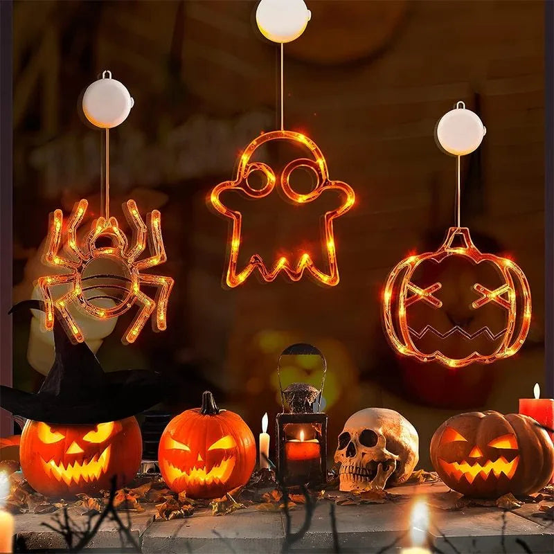 Set of seven Halloween LED hanging lights with spider, pumpkin, and ghost designs for window decoration