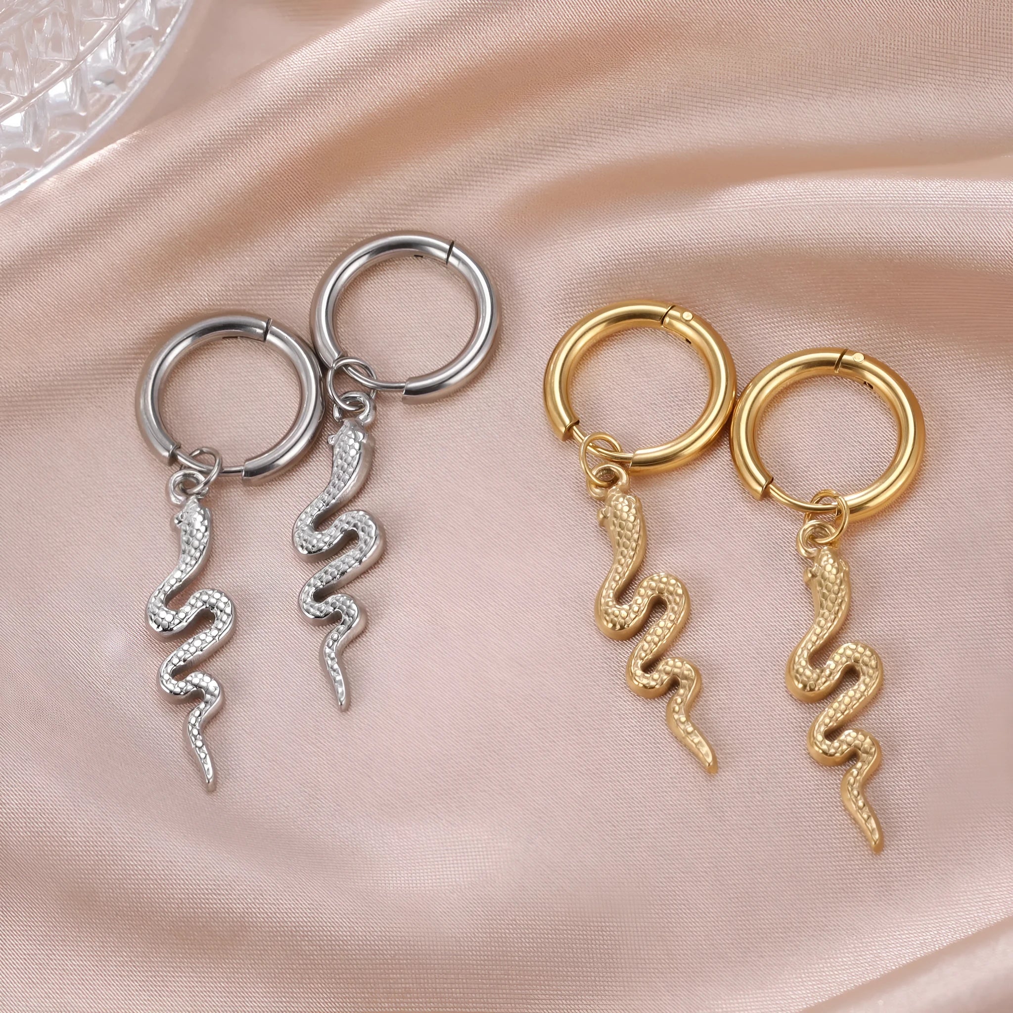 Gold plated stainless steel snake-shaped vintage earrings with clip fastenings