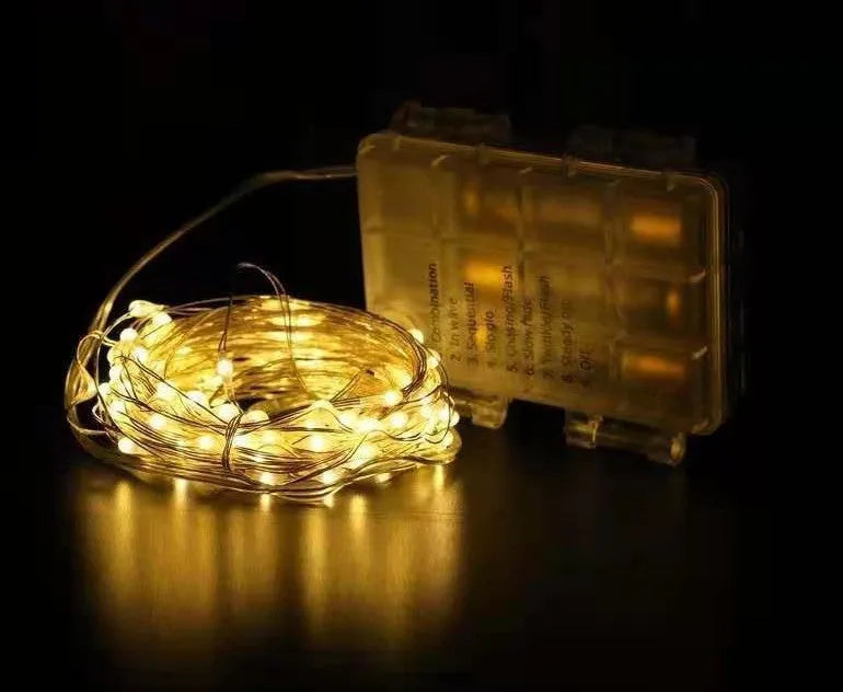 12-metre copper wire LED string lights with 120 bulbs showing multiple colour options and USB power connection