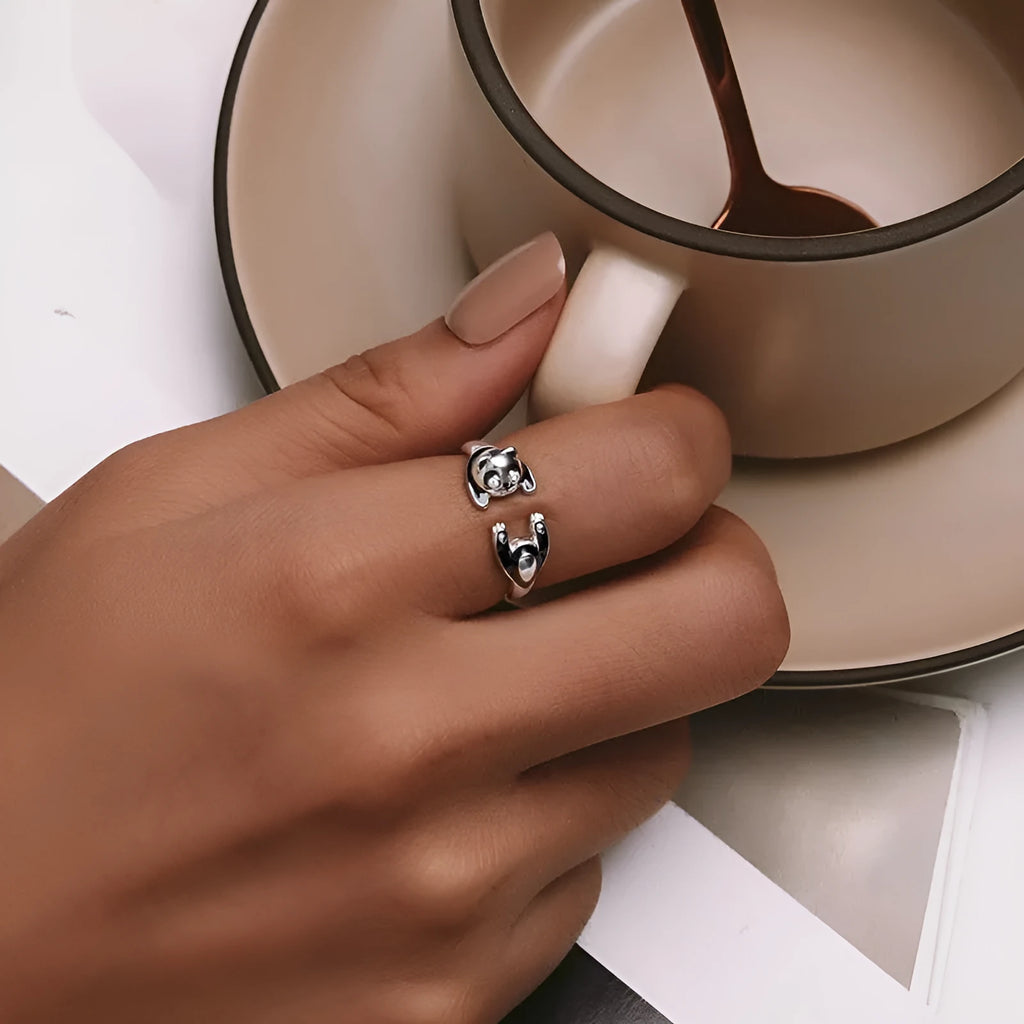 Adjustable panda sterling silver ring with white gold plating and open bracelet design