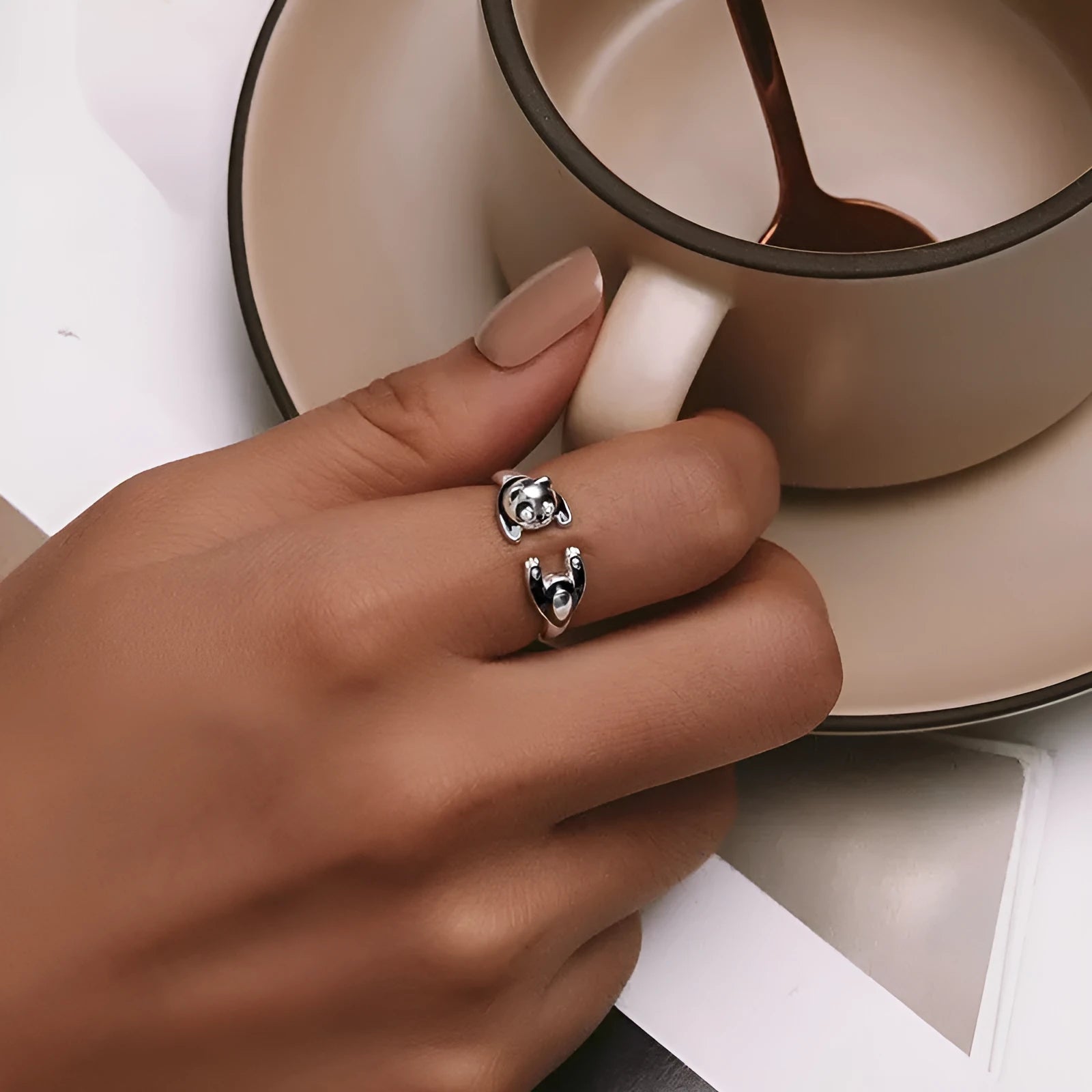 Adjustable panda sterling silver ring with white gold plating and open bracelet design