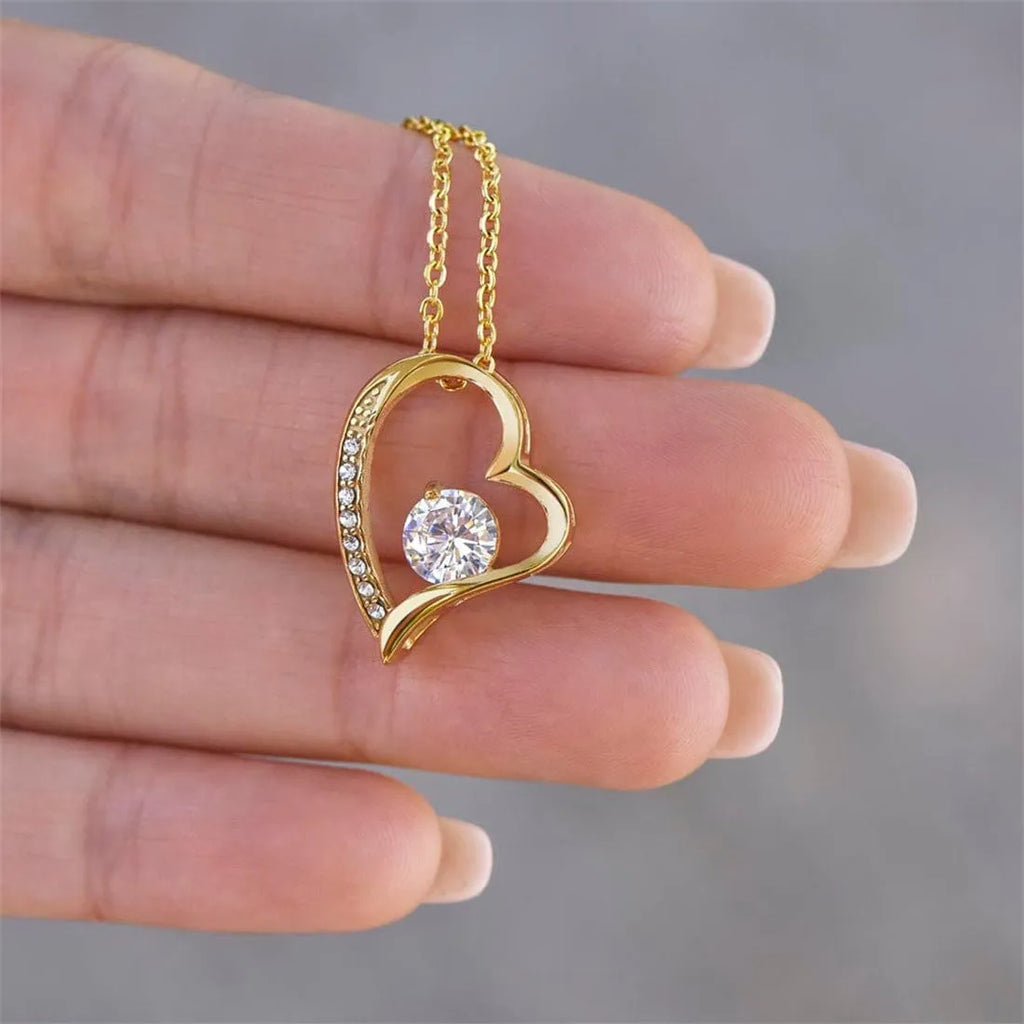 Hollow heart pendant necklace with adjustable chain in gold or silver colour on gift box