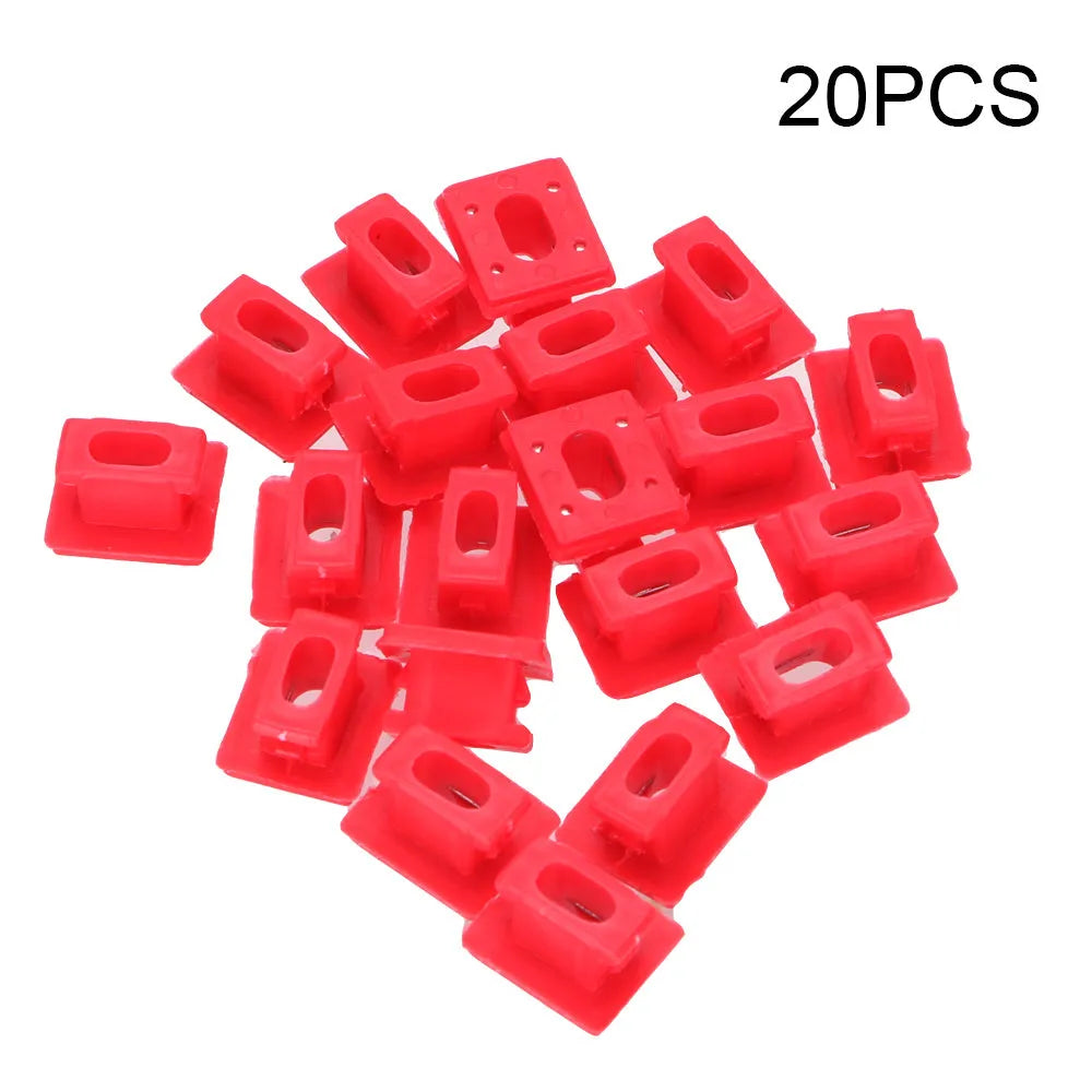 Ten black plastic BMW interior door panel trim clips or fasteners on a white background.