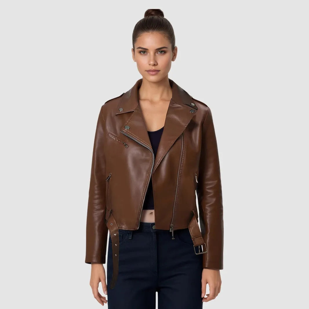 Women's black PU leather motorcycle jacket with lapel collar and waist belt on hanger.