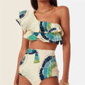 White women's one-shoulder swimsuit with lotus leaf design and thigh split