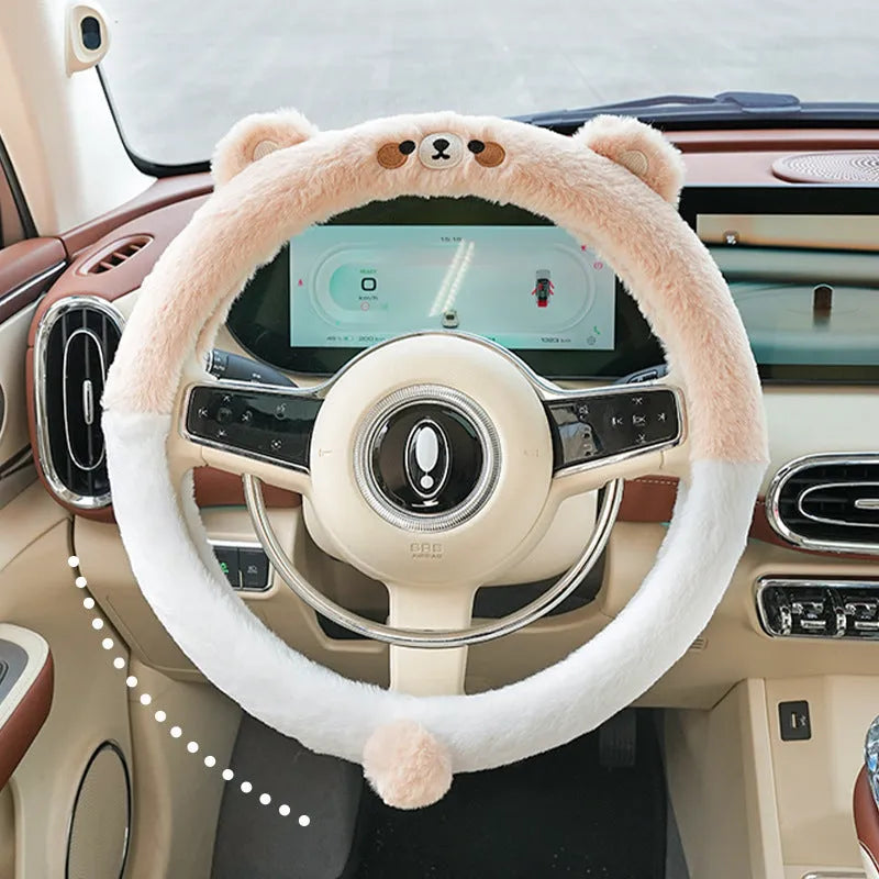 Plush winter car steering wheel cover with embroidered bear motif, designed for 38cm diameter wheels.