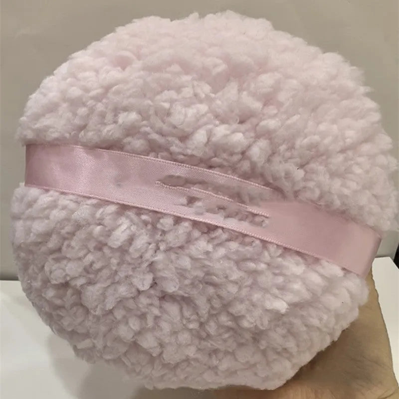 Oversized rectangular plush powder puff for makeup, shown in white, pink, and skin colour options.