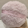 Oversized rectangular plush powder puff for makeup, shown in white, pink, and skin colour options.