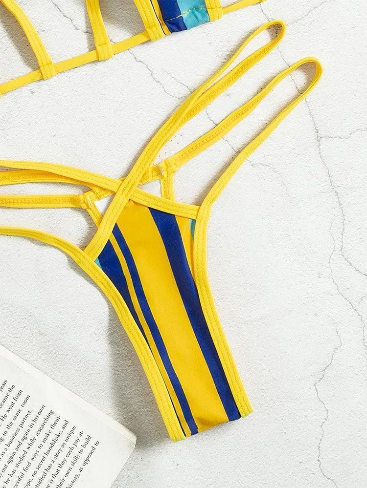 Yellow women's split swimsuit with neck-hanging style and hollow design
