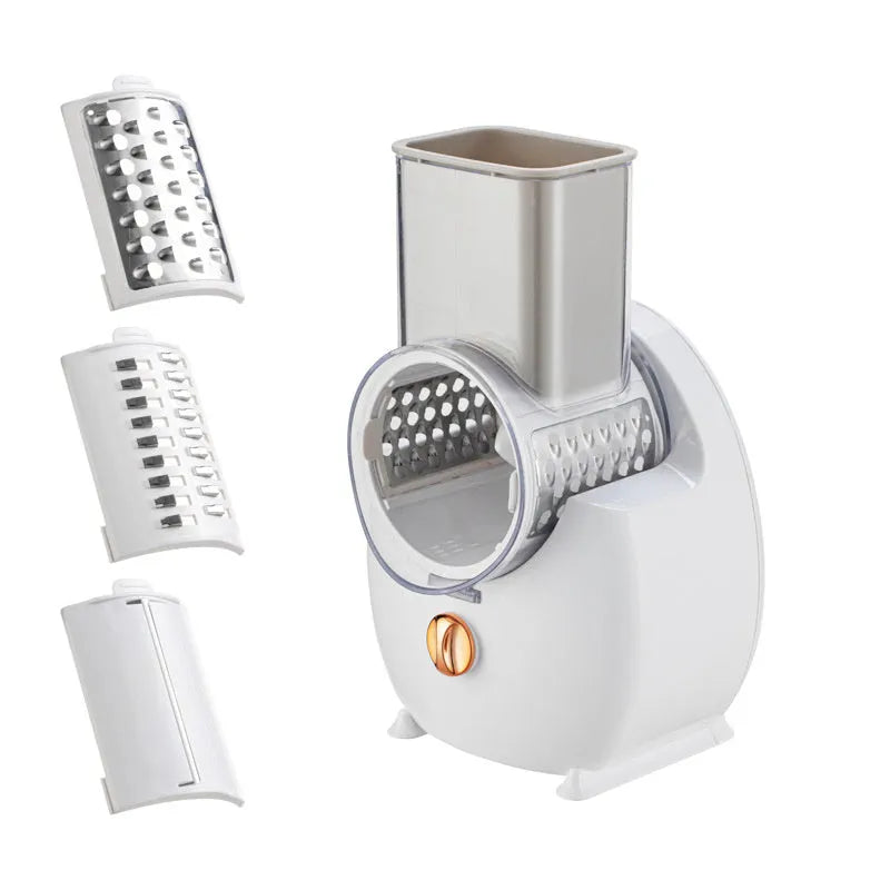 White electric vegetable slicer with suction base and multiple blades for cutting potatoes and carrots