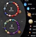 Set of twelve natural stone beaded bracelets for all zodiac signs on display
